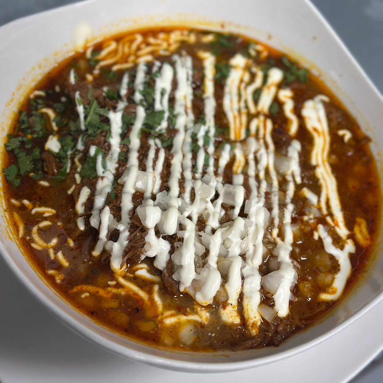Birria Stuffed Potato.